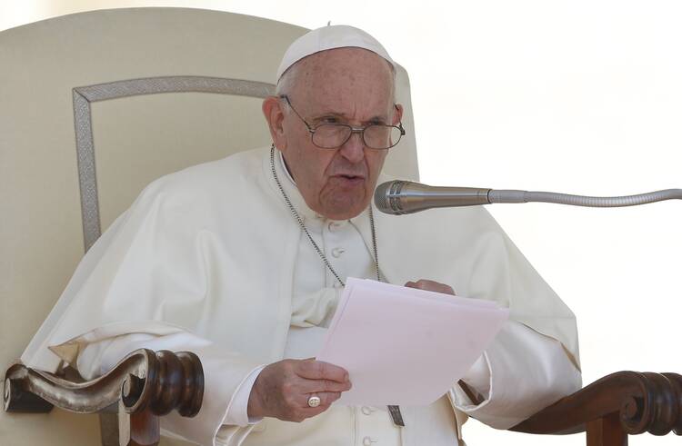 Pope Francis speaks during his general audience in St. Peter's Square at the Vatican May 18, 2022.