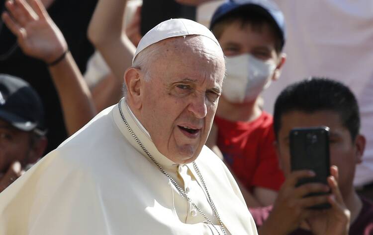 Pope Francis is pictured while greeting the crowd during his general audience in St. Peter's Square at the Vatican May 25, 2022.