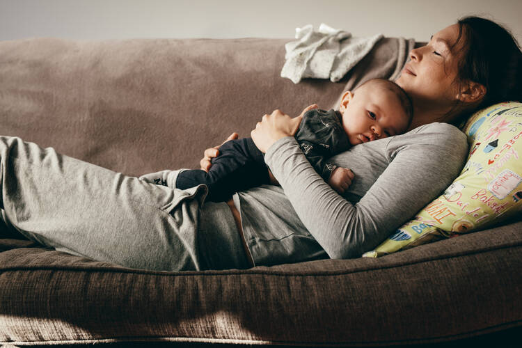 Parenting is punished in this country, and the punishments are multiplied for mothers, who continue to do the lion’s share of caregiving. (iStock/jacoblund)