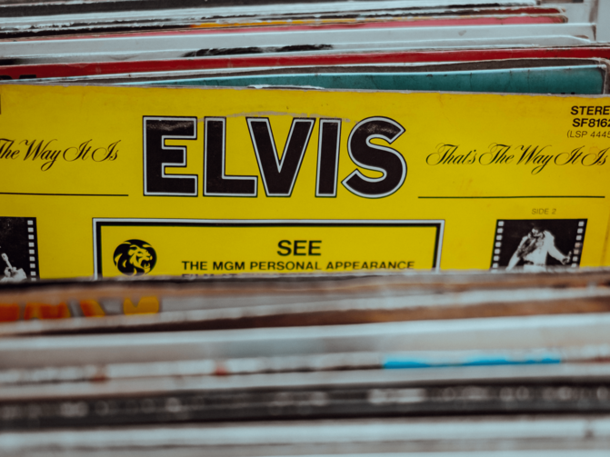 An array of album covers, with one album sticking out that says "Elvis"