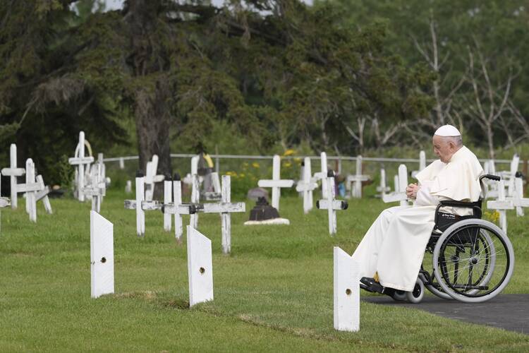 Pope Francis prays at the Ermineskin Cree Nation Cemetery before meeting with First Nations, Métis and Inuit communities at Maskwacis, Alberta, July 25, 2022. (CNS photo/Vatican Media)