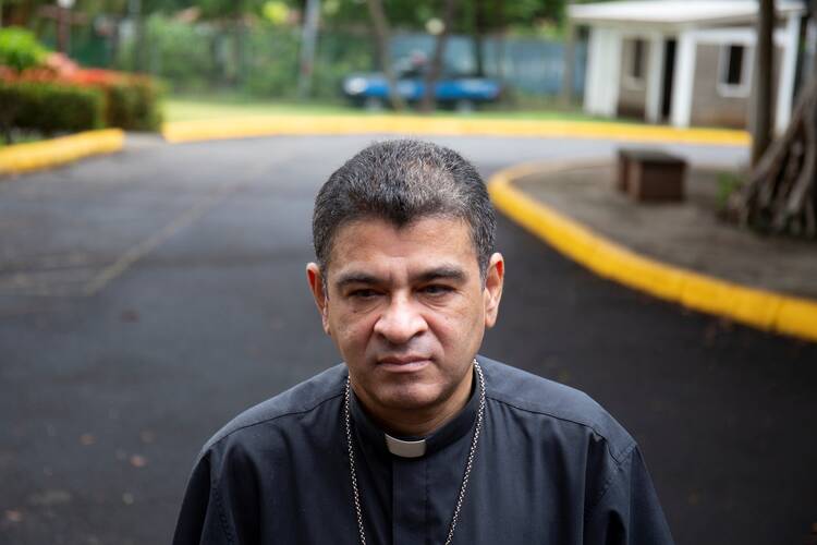 Bishop Álvarez stands facing the camera.