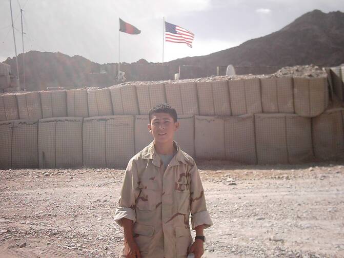 Hussain Kazimi as a teenager, working as an interpreter for the U.S. military in Afghanistan (photo courtesy of the author)