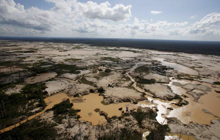 An area deforested by wildcat mining is seen in a zone known as Mega 14, in the southern Amazon region of Madre de Dios, Peru.