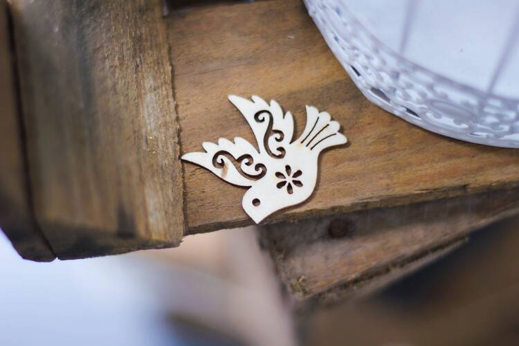 Paper dove on a table