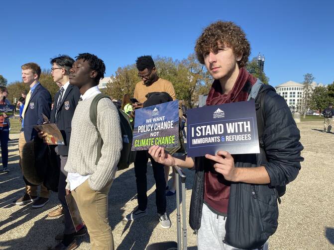 Students from the nation's Jesuit schools gather near the U.S. Capitol in Washington on Nov. 8, 2021, to advocate for the environment and for immigration as part of the Ignatian Family Teach-in for Justice. (CNS photo/Rhina Guidos)
