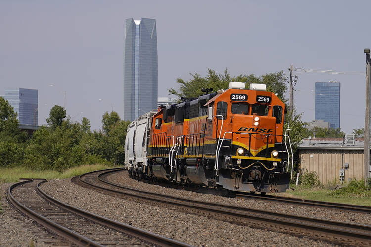 A BNSF locomotive heads south out of Oklahoma City on Sept. 14, 2022. (AP Photo/Sue Ogrocki, File)