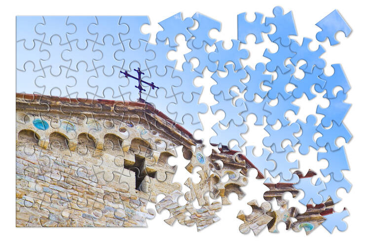 the top point of a church with a cross at the top, with blue sky, all made of puzzle pieces that are slowly separated as you look left to right