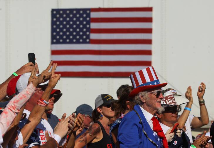 People in Mesa, Ariz., attend a midterm election rally.