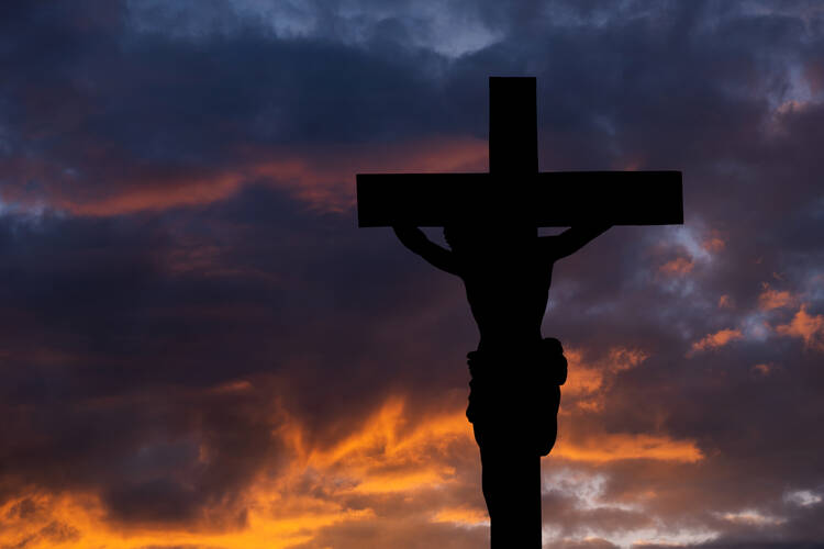 crucifix at sunset