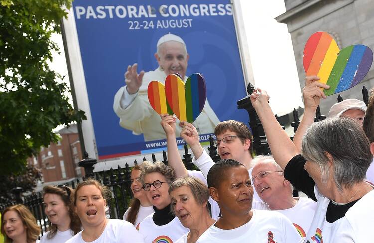 An LGBT choir sings outside the Pastoral Congress at the World Meeting of Families in Dublin Aug. 23, 2018. (CNS photo/Clodagh Kilcoyne, Reuters)