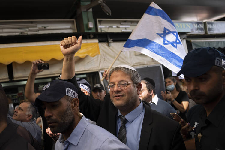 Israeli far-right lawmaker and the head of "Jewish Power" party, Itamar Ben-Gvir visits at Hatikva Market in Tel Aviv during his campaign. Israel's outgoing coalition was one of its most diverse, but the country's incoming coalition is hoping to roll back many of the achievements of the former government. (AP Photo/Oded Balilty, File)