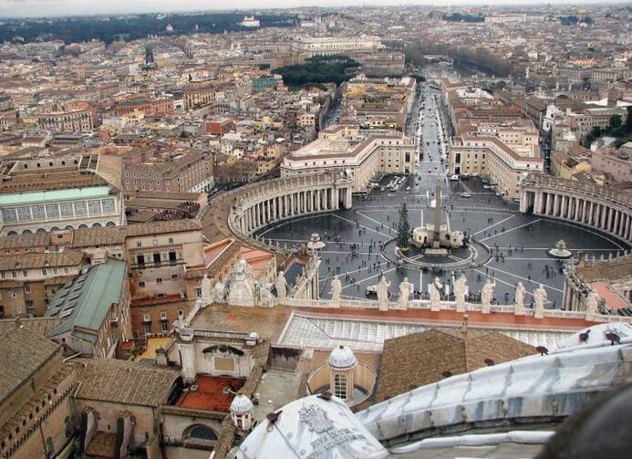 A view of St. Peter’s Square, Vatican City and Rome from the top of Michelangelo’s dome in St. Peter’s Basilica.