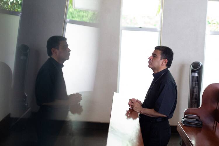 Bishop Rolando José Álvarez Lagos of Matagalpa, Nicaragua prays at a Catholic church in Managua, Nicaragua.