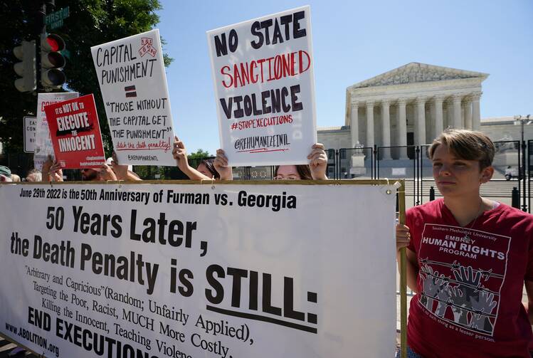 Members of the Abolitionist Action Committee protest capital punishment in front of the U.S. Supreme Court building in Washington on June 29, 2022, to mark the 50th anniversary of the 1972 Supreme Court decision in Furman v. Georgia, which determined the death penalty was unconstitutional. (CNS photo/Kevin Lamarque, Reuters)