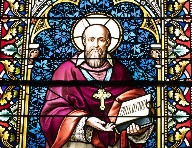 A likeness of St. Francis de Sales is seen in stained glass at Caldwell Chapel on the campus of The Catholic University of America 