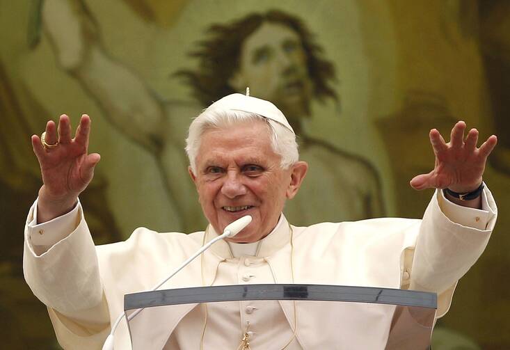 Pope Benedict XVI waves from the balcony of his summer residence in Castel Gandolfo, Italy, during his Angelus prayer on Aug. 29, 2010. (CNS photo/Max Rossi, Reuters)