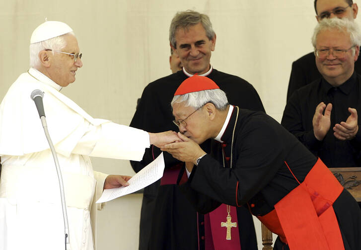 Chinese Cardinal Joseph Zen, right, Bishop of Hong Kong, kisses the hand of Pope Benedict XVI.