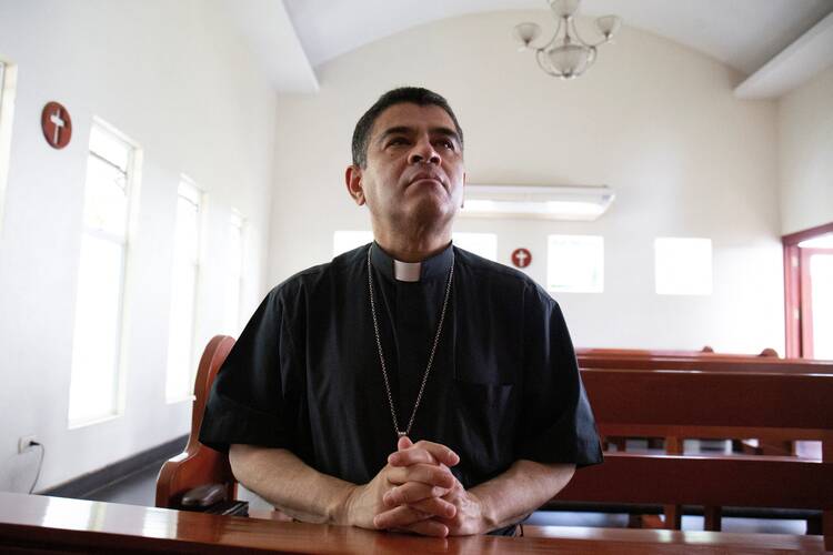 Bishop Rolando Álvarez of Matagalpa, Nicaragua, a frequent critic of Nicaraguan President Daniel Ortega, prays at a Catholic church in Managua May 20, 2022. A Nicaraguan court ruled Jan. 10, 2023, that Bishop Álvarez will stand trial on charges of conspiracy and spreading false information. (OSV News photo/Maynor Valenzuela, Reuters)