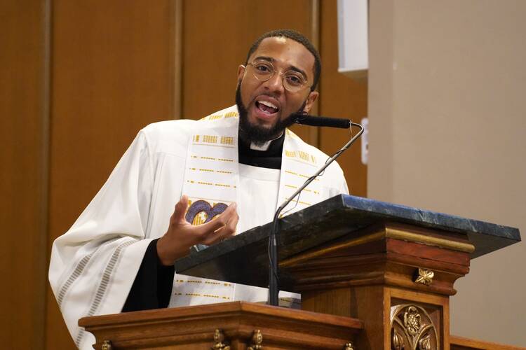 The Rev. Ajani Gibson of the Archdiocese of New Orleans preaches during a prayer service in honor of the Rev. Martin Luther King Jr. at St. Kevin Church in Queens, N.Y., on Jan. 16. (OSV News photo/Gregory A. Shemitz)