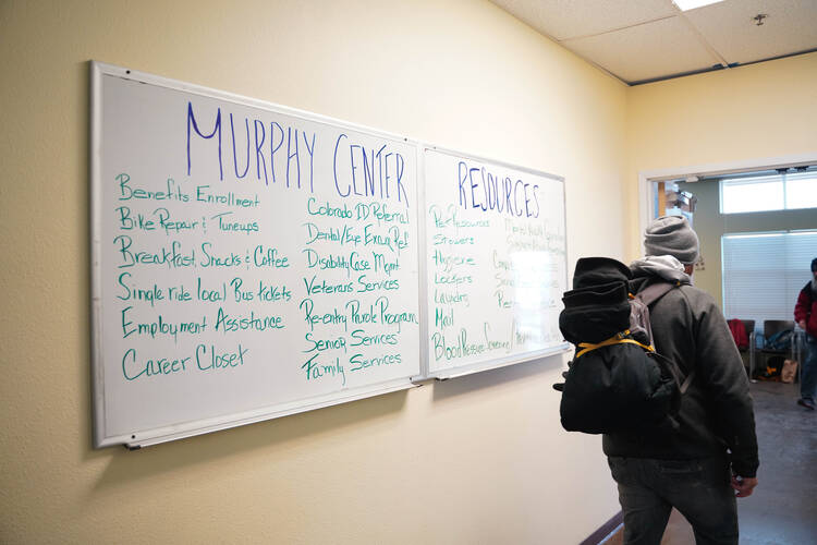 A whiteboard with a list of services offered by the Murphy Center