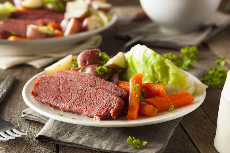 corned beef and cabbage and carrots on a plate for st patricks day
