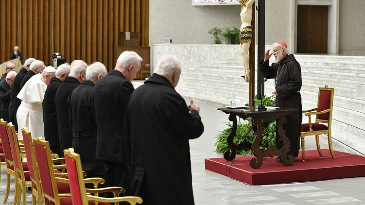 Cardinal preaches to Roman Curia in Lent in Vatican audience hall.