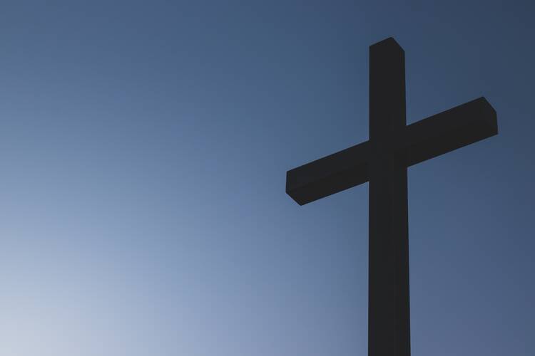 Cross with blue background.