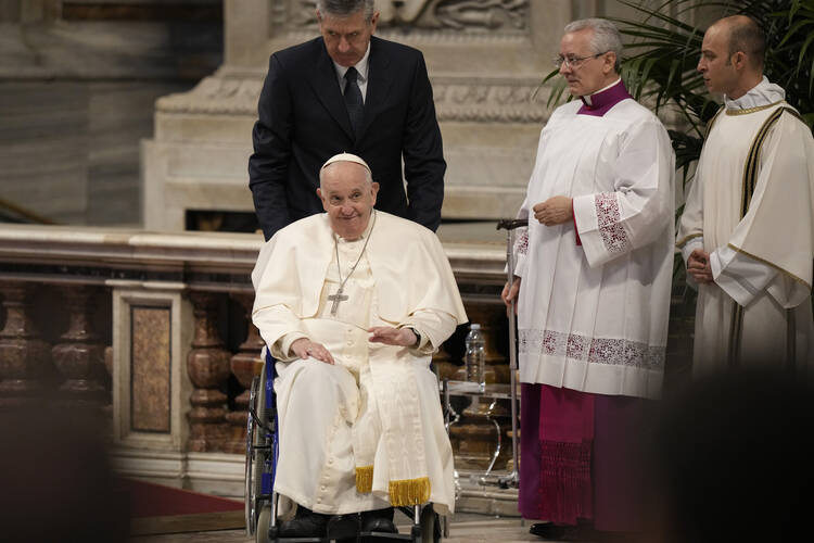 Pope Francis in a wheelchair after the chrism Mass