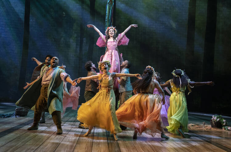 Phillipa Soo (center) and company in Lincoln Center Theater's production of CAMELOT. 