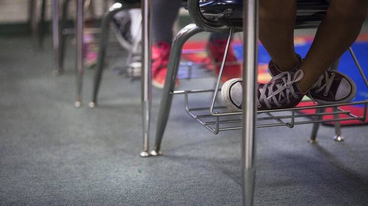 Children's feet in a school