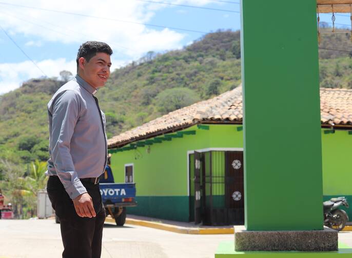 The Rev. Luis Melquiades Suazo, pastor of St. Anthony of Padua parish in the nearby municipality of San Antonio del Norte, visits Mercedes De Oriente.