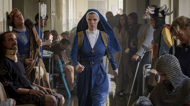 Betty Gilpin as an AI-fighting nun in ”Mrs. Davis”
