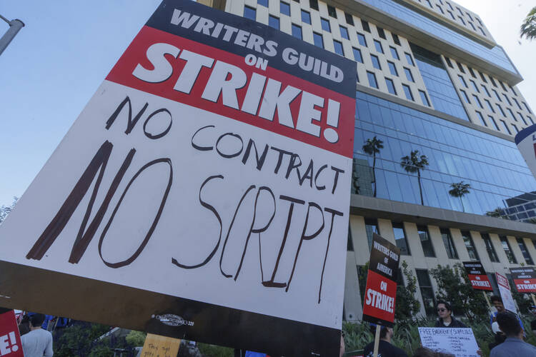 a sign reading strike! no contract no script