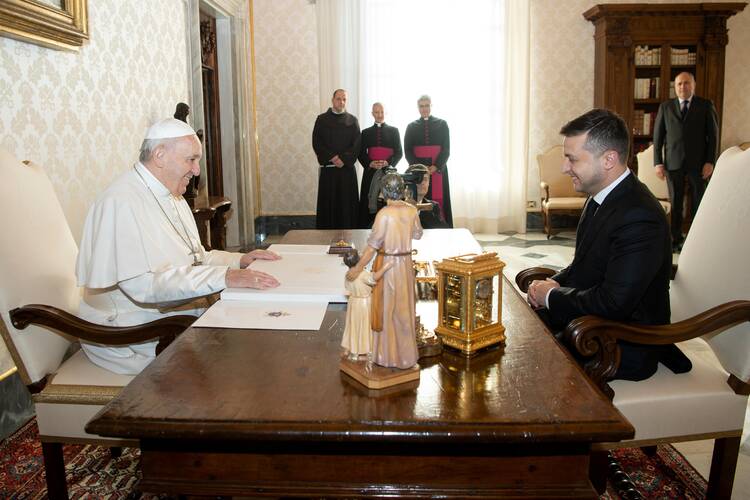 pope francis sits across from president volodymyr zelensky in the vatican
