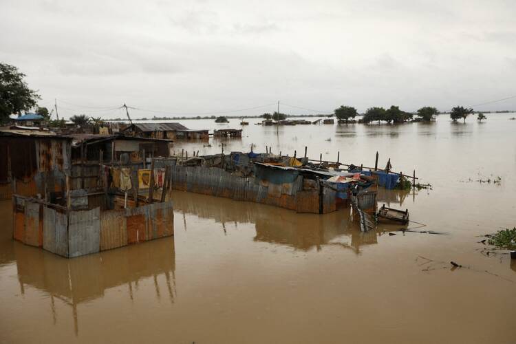 Houses are submerged in flood waters in Lokoja, Nigeria, Oct.13, 2022. More than half of the 36 states of the country are affected. More than 600 people have died, with more than 1.4 million people displaced. (CNS photo/Afolabi Sotunde, Reuters)