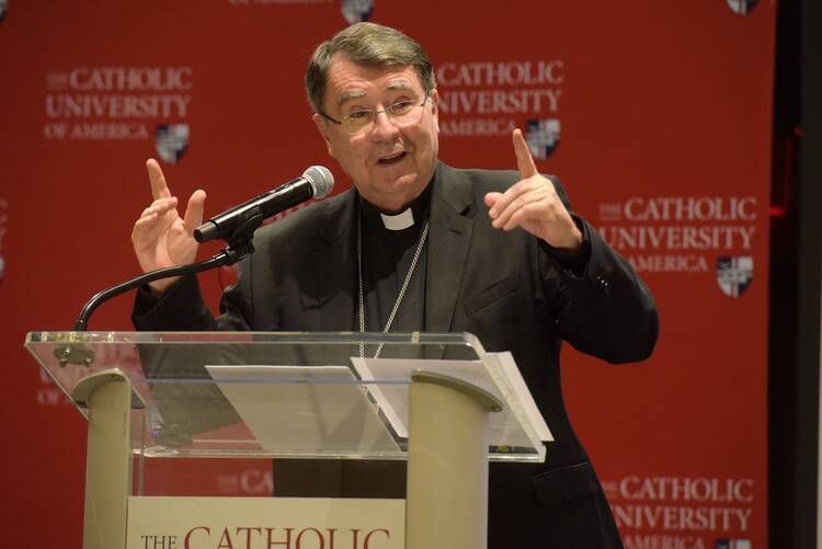Archbishop Christophe Pierre, apostolic nuncio to the United States, gives the annual Cardinal Dearden Lecture at The Catholic University of America in Washington April 26, 2023. 