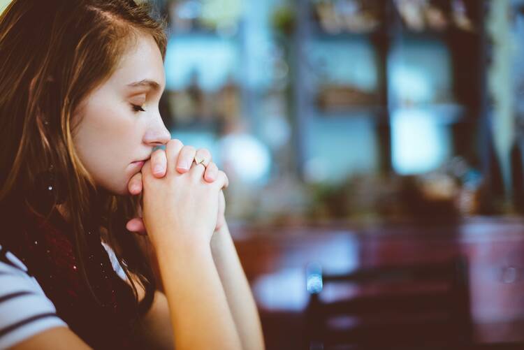 woman in church praying