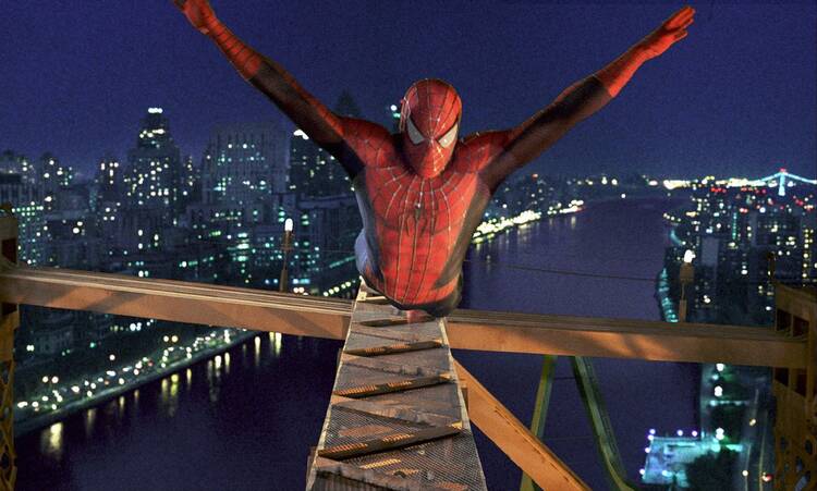 Tobey Maguire soars as the web-clad superhero in "Spider-Man."