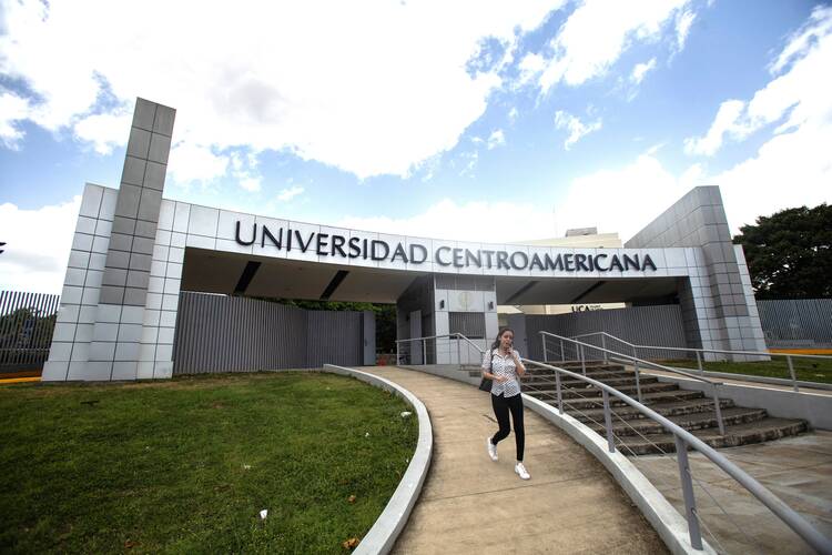 A woman leaves the Jesuit-run Central American University in Managua, Nicaragua, on Aug. 16, 2023. The university suspended operations Aug. 16 after Nicaraguan authorities branded the school a "center of terrorism" the previous day and froze its assets for confiscation. (OSV News photo/Reuters)