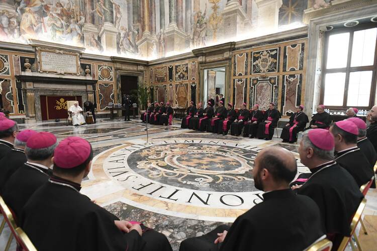 Pope Francis speaks with bishops from Colombia on the final day of their “ad limina” visit to the Vatican on March 24, 2023. (CNS photo/Vatican Media)