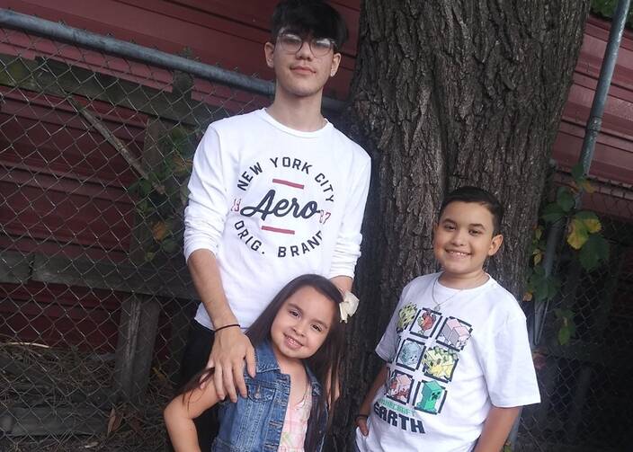 The children of single mother Jessica Moreno of Wood Dale, Ill., (Julian, 16, Jenesis, 6, and Jayden, 12) are seen in an undated photo. Ms. Moreno used a series of $750-a-month checks under the temporarily expanded child tax credit program to rent an apartment for herself and her children and avoid becoming homeless. (CNS photo/courtesy Jessica Moreno)