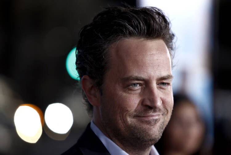 Matthew Perry arrives at the premiere of "The Invention of Lying" in Los Angeles on Monday, Sept. 21, 2009. Perry, who starred as Chandler Bing in the hit series “Friends,” has died. He was 54. (AP Photo/Matt Sayles, File)