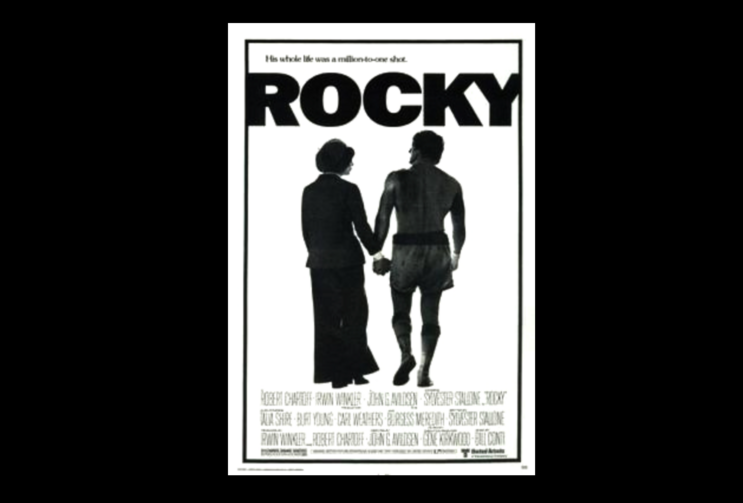 The movie poster of the original Rocky film