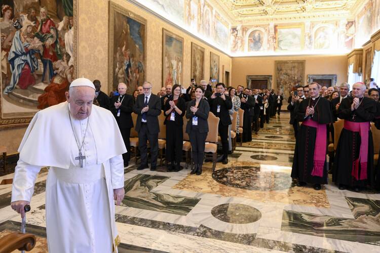 Pope Francis arrives for a meeting of university chaplains, sponsored by the Dicastery for Culture and Education, in the Apostolic Palace at the Vatican Nov. 24, 2023. The next day the pope canceled his scheduled meetings because of flu-like symptoms and underwent a CT scan to rule out pulmonary complications, the Vatican press office said. (CNS photo/Vatican Media)