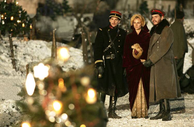 Guillaume Canet, left, Diane Kruger and Daniel Bruhl star in a scene from the movie "Joyeux Noel" (CNS photo/Sony Pictures Classics).