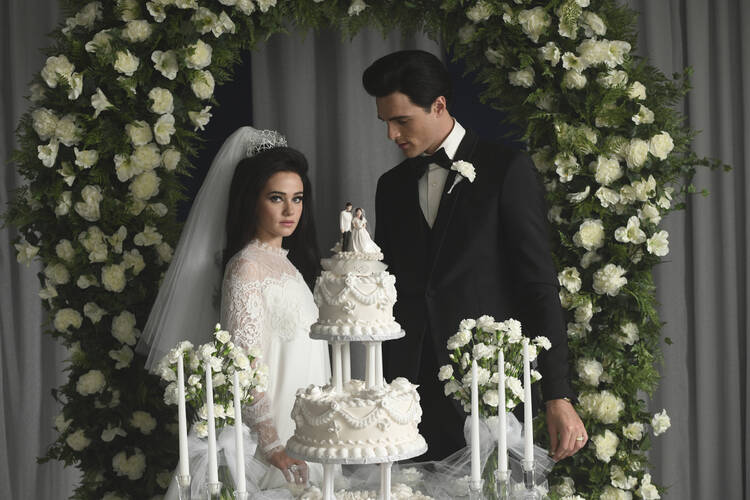 Cailee Spaeny and Jacob Elordi as Priscilla and Elvis Presley at their wedding in a scene from the film ‘Priscilla’