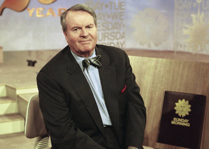 Charles Osgood, anchor of CBS's "Sunday Morning," poses for a portrait on the set in New York on March 28, 1999. Osgood, who anchored the popular news magazine's for more than two decades, was host of the long-running radio program “The Osgood File” and was referred to as CBS News’ poet-in-residence, has died. He was 91. (AP Photo/Suzanne Plunkett, File)