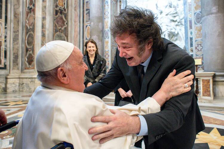 Pope Francis and Argentine President Javier Milei share a laugh after the Mass for the canonization St. Maria Antonia de Paz Figueroa, known as Mama Antula, in St. Peter's Basilica at the Vatican Feb. 11, 2024. She is the first female saint from Argentina. (CNS photo/Vatican Media)