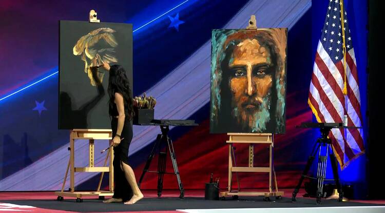 An artist displays an image of former president Donald Trump and an image of the face of Christ at the Conservative Political Action Conference's annual Ronald Reagan Dinner on Feb. 23, 2024. (OSV News photo/screen grab CPAC)